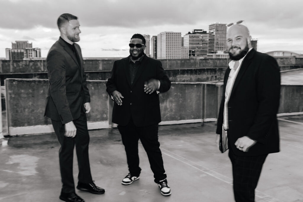 Three DJ's from team Graingertainment vibing on a Tampa, Florida rooftop