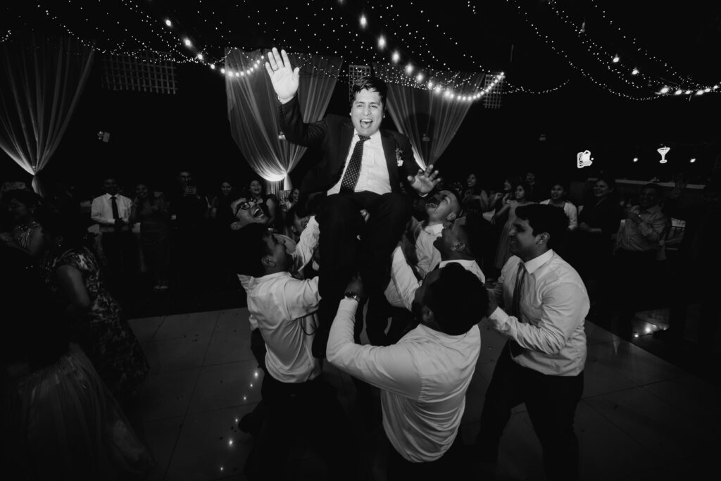 Rowdy bridal party on the dance floor 