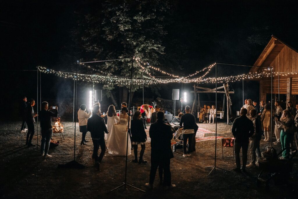 Backyard wedding with string lights